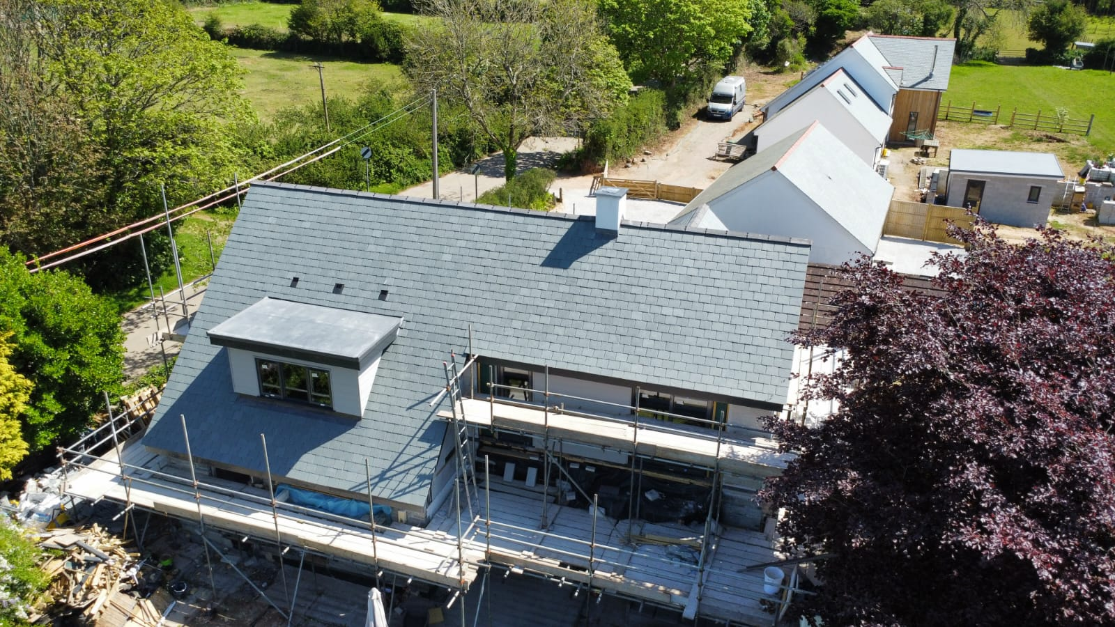 Aerial view of Woodlands, Perran Downs — front elevation with dormer and chimney